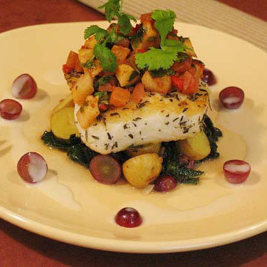 Image of Grilled Swordfish with Coconut-Pineapple Relish, Roasted Baby Potatoes/Wilted Green Kale Laced in Coconut Butter Sauce