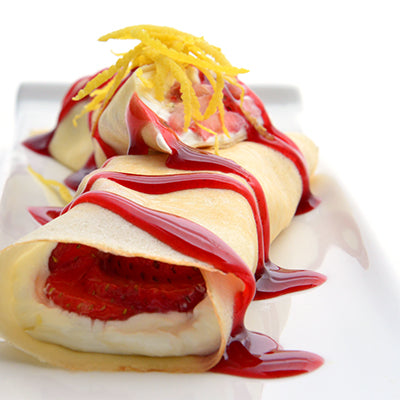 Image of Strawberry Crepes with Raspberry Sauce