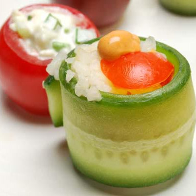 Image of Stuffed Baby Heirloom Tomatoes and Cucumber Roll Hors d'Oeuvres