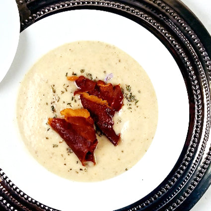 Cream of Sunflower Choke Soup with Crispy Prosciutto and Minced Rosemary