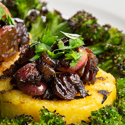 Grilled Hatch Polenta on Mustard Greens with Muscato™ Grape Agrodolce