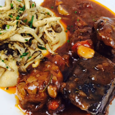 Image of Red Wine Braised Short Ribs with Creamy Polenta and Wild Mushroom Ragout