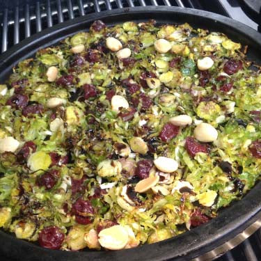 Image of Shredded Roasted Brussels Sprouts with Sour Cherries and Marcona Almonds in a Fig Balsamic Vinaigrette