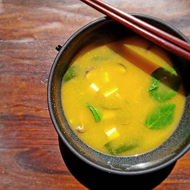 Image of Pumpkin Garlic Miso Soup with Japanese Mushrooms and Silken Tofu