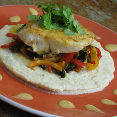 Image of Pan Seared Wild Halibut with Celeriac Purée, Sautéed Sweet Pepper Medley and Tangerine-Citrus Beurre Blanc Sauce