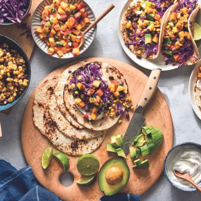 Image of Sweet Corn and Black Bean Tacos with Peach Salsa and Red Cabbage