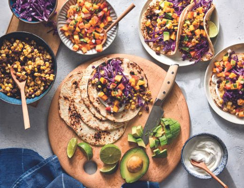 Image of Sweet Corn and Black Bean Tacos with Peach Salsa and Red Cabbage