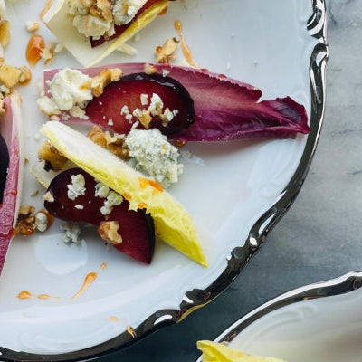 Image of Endive Appetizer with Plums, Blue Cheese, Walnuts & Hot Habanero Honey