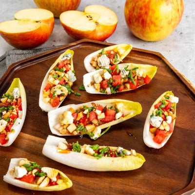 Image of Endive Boats With Green Olive, Parsley, and Walnut Salad
