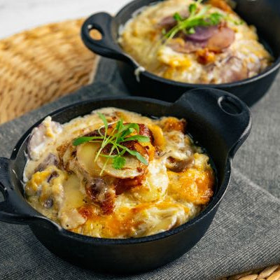 Image of Scalloped Gemstone® Potatoes with Caramelized Hatch Sweet Onions
