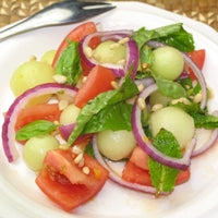 Image of Honeydew & Roma Tomato Salad