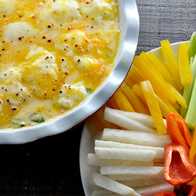 Image of Cheesy Spinach Dip with Veggie Sweet Mini Pepper Scoops & Crudités