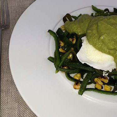 Image of Cabo-Style Poached Eggs with Roasted Poblano Chiles, Charred Corn & Poblano Cream Sauce