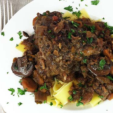 Image of Basque Style Braised Lamb Shanks with Rosemary and Red Wine