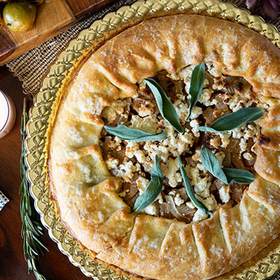 Image of Brown Butter Pumpkin Galette With Caramelized Onions, Goat Cheese and Sage