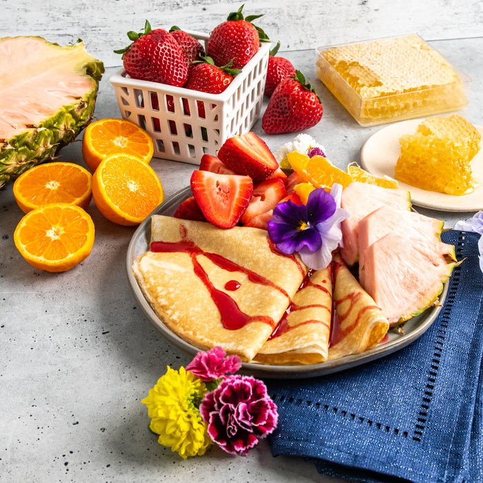 Melissa's Crepes, Pinkglow Pineapples, Ojai Pixie Tangerines, Strawberries, and Honeycomb for Mother's Day