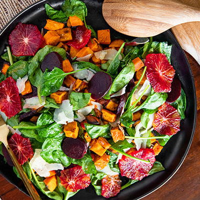 Image of Cinnamon Persimmon and Roasted Beet Autumn Salad with Blood Orange Vinaigrette