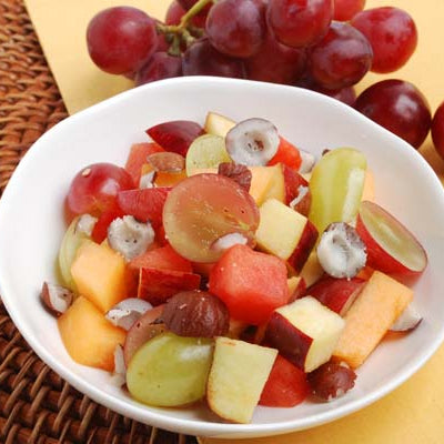 Image of Coquito Topped Fruit Salad