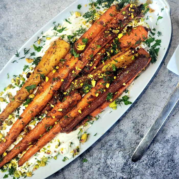 Moroccan Roasted Carrots with Salted Garlic Labneh, Pistachios, and Dill