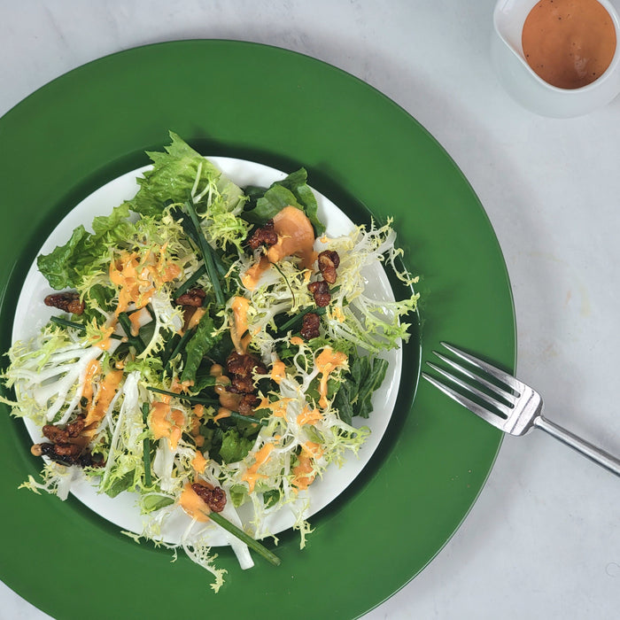 Image of Frisee and Romaine Salad with Spiced Walnuts and Chives in a Tomato Vinaigrette