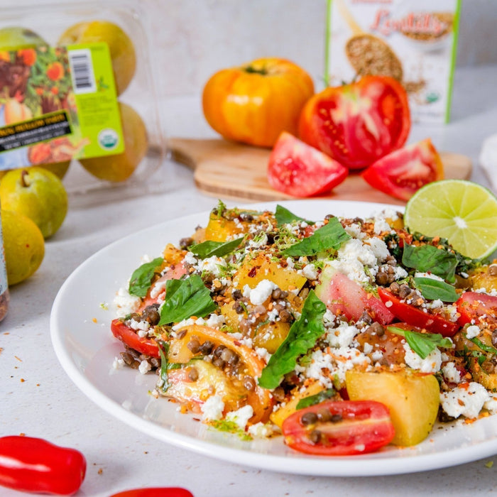 Marinated Tomato and Plum Salad with Steamed Lentils, Feta, and Avocado Toast Seasoning