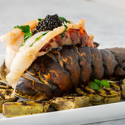 Image of Basil Butter Poached Lobster with Grilled Baby Purple Artichokes and Caviar