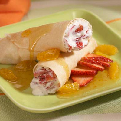 Image of Organic Strawberry Crepes with Pixie Tangerine Sauce