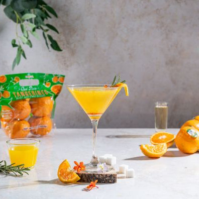 Pixie tangerine champagne cocktail from Melissa’s vibrant and refreshing citrus drink