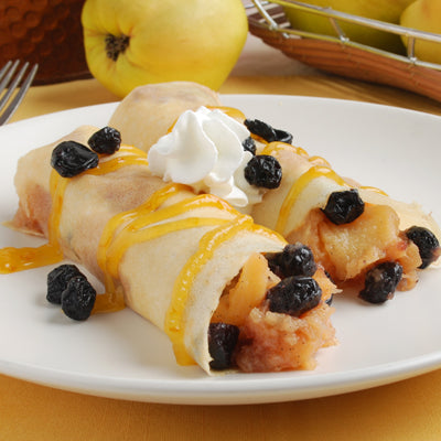 Image of Quince Butter Filled Crepes with Pixie Tangerine Sauce