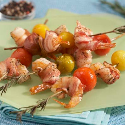 Image of Rosemary Skewered Bacon Wrapped Shrimp with Baby Heirloom Tomatoes