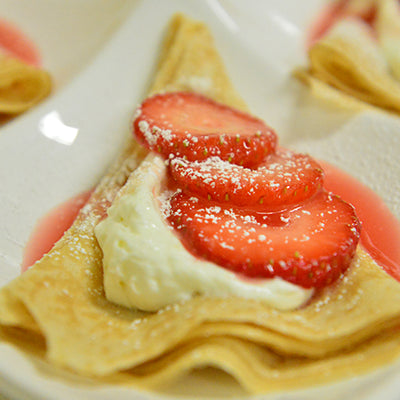 Image of Strawberry Crepes with Blood Orange Sauce