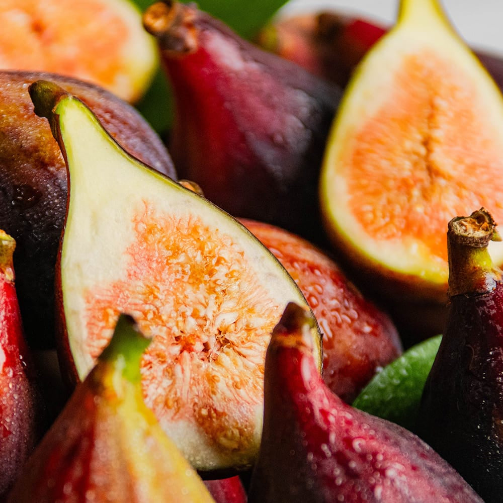 Fresh Figs and one sliced in half.